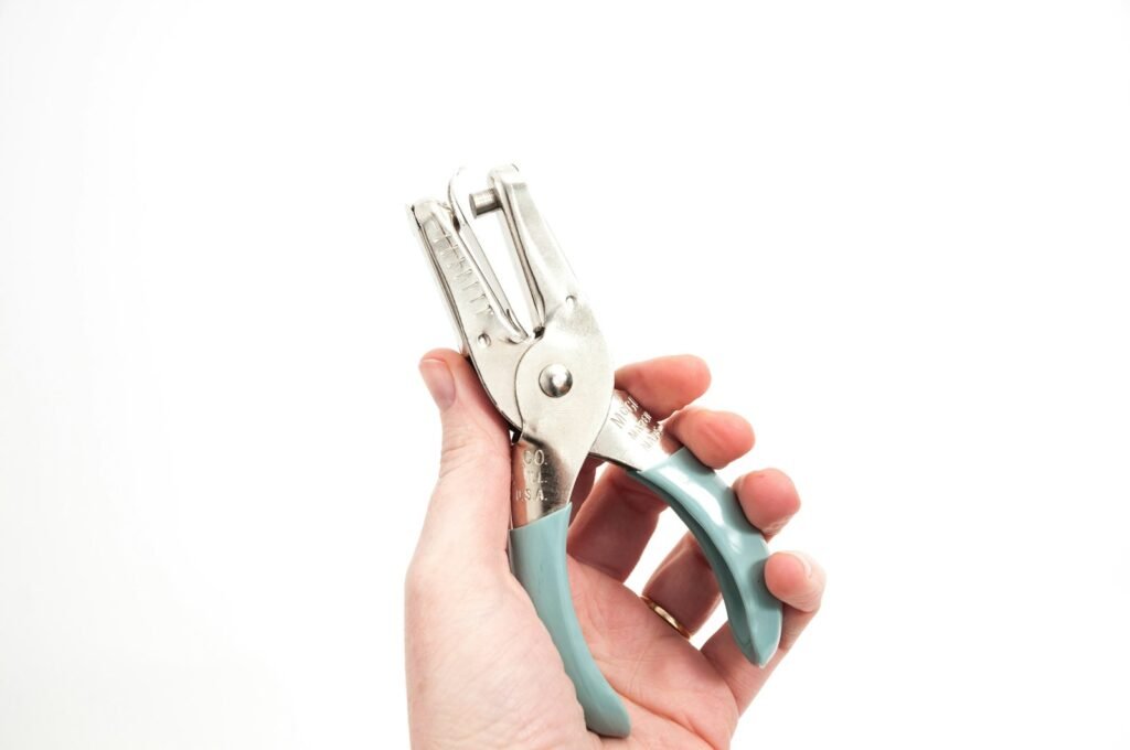 Technician holding cutting tools
